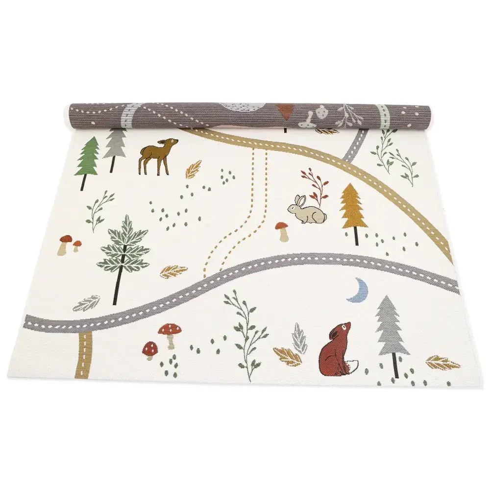 Children's rug with indoor and outdoor forest design