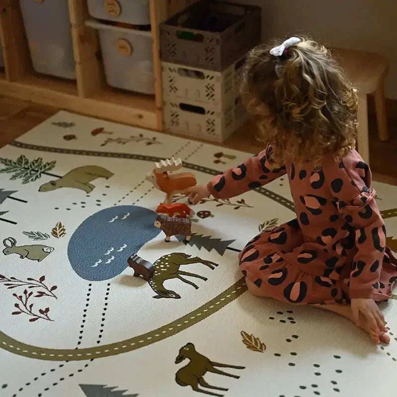 Children's rug with indoor and outdoor forest design
