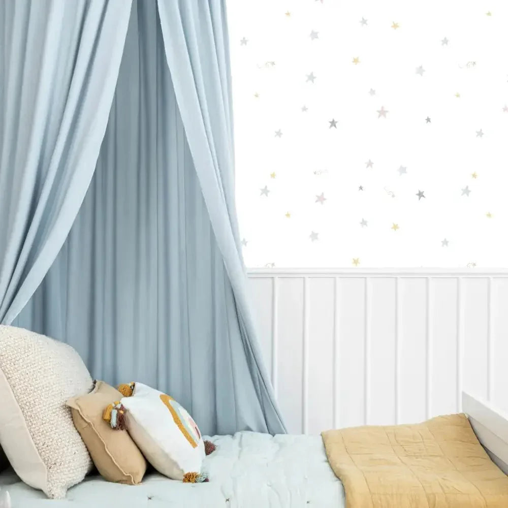 Papel pintado infantil con estrellas acquarela tonos pastel