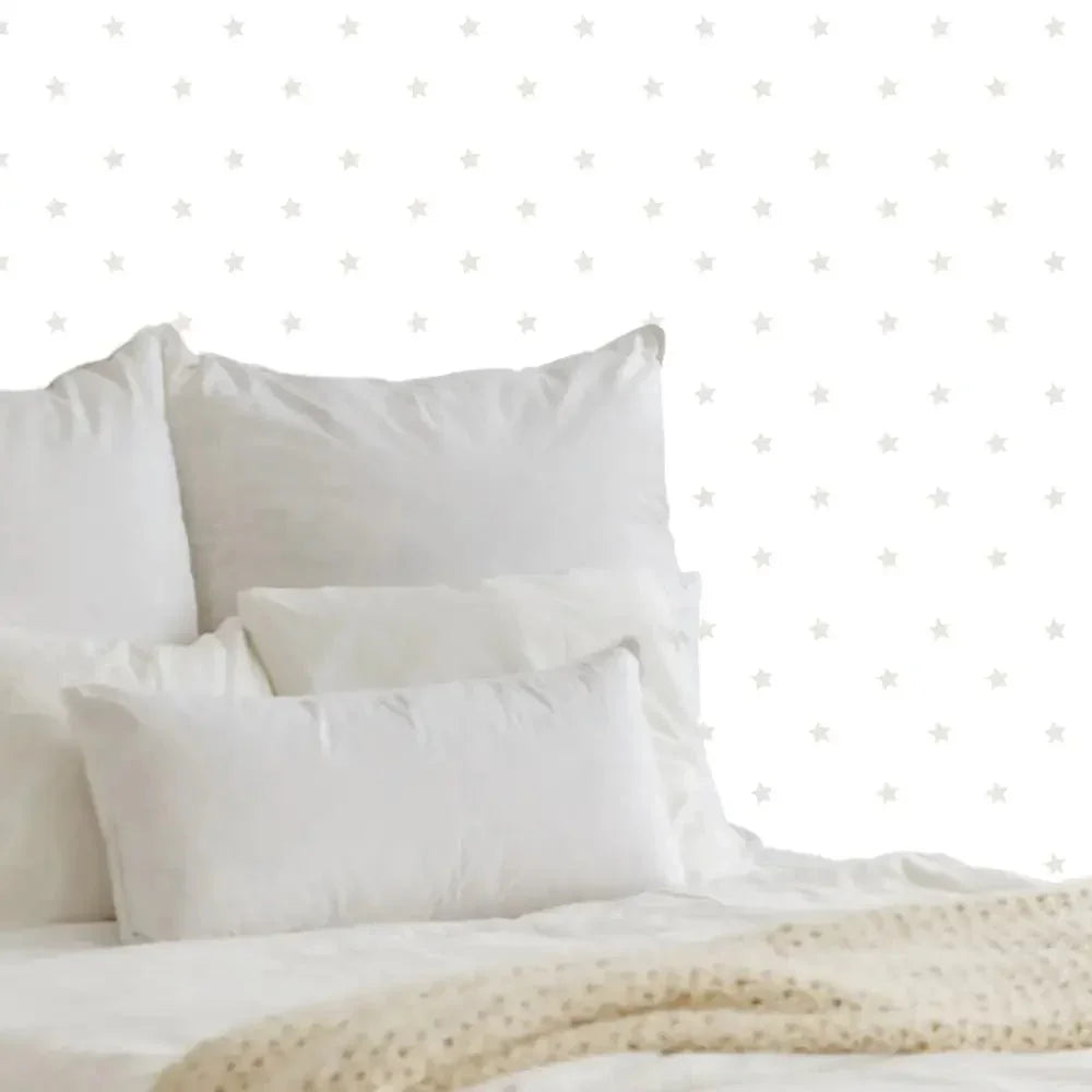 Papel pintado con estrellas en beige para niños