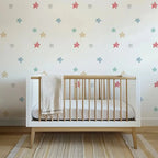 Papel pintado infantil de estrellas en acuarela multicolor